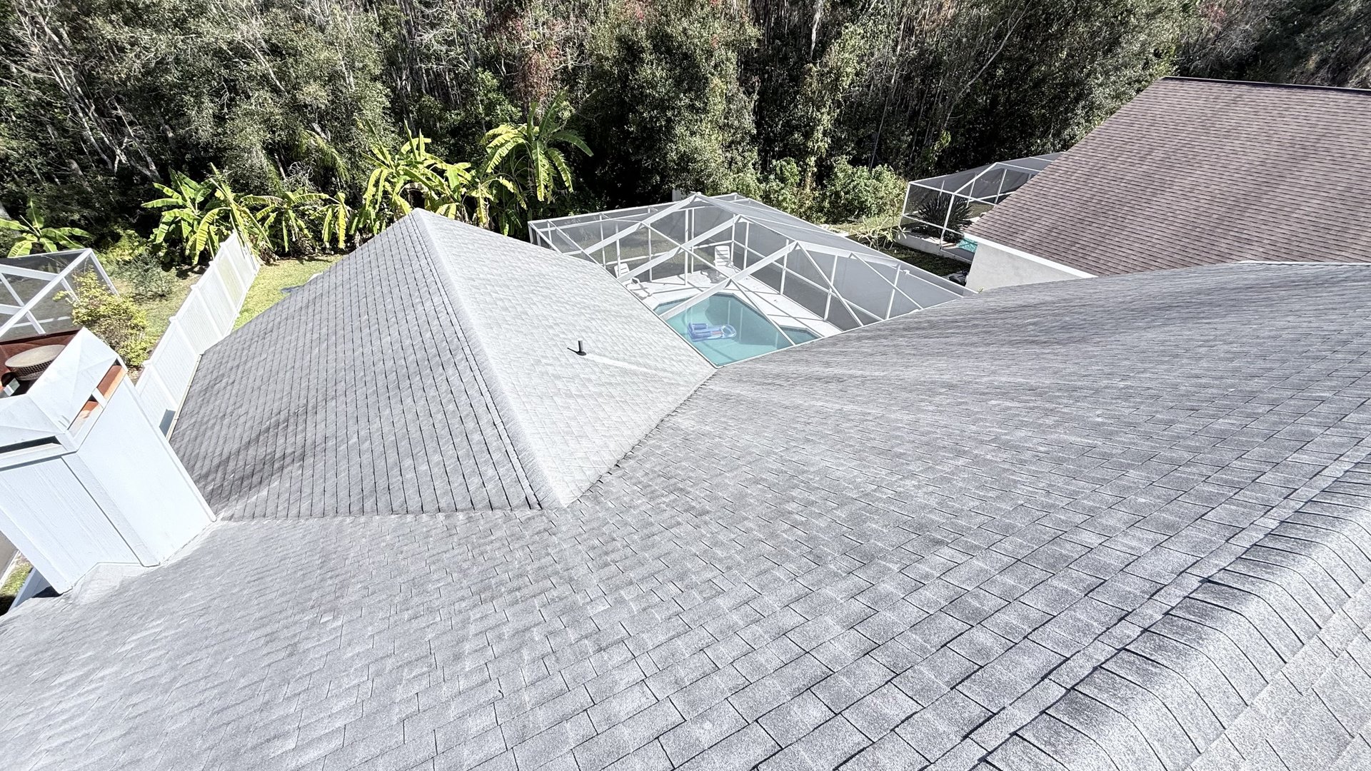 Dirty roof covered in algae and black streaks before soft washing